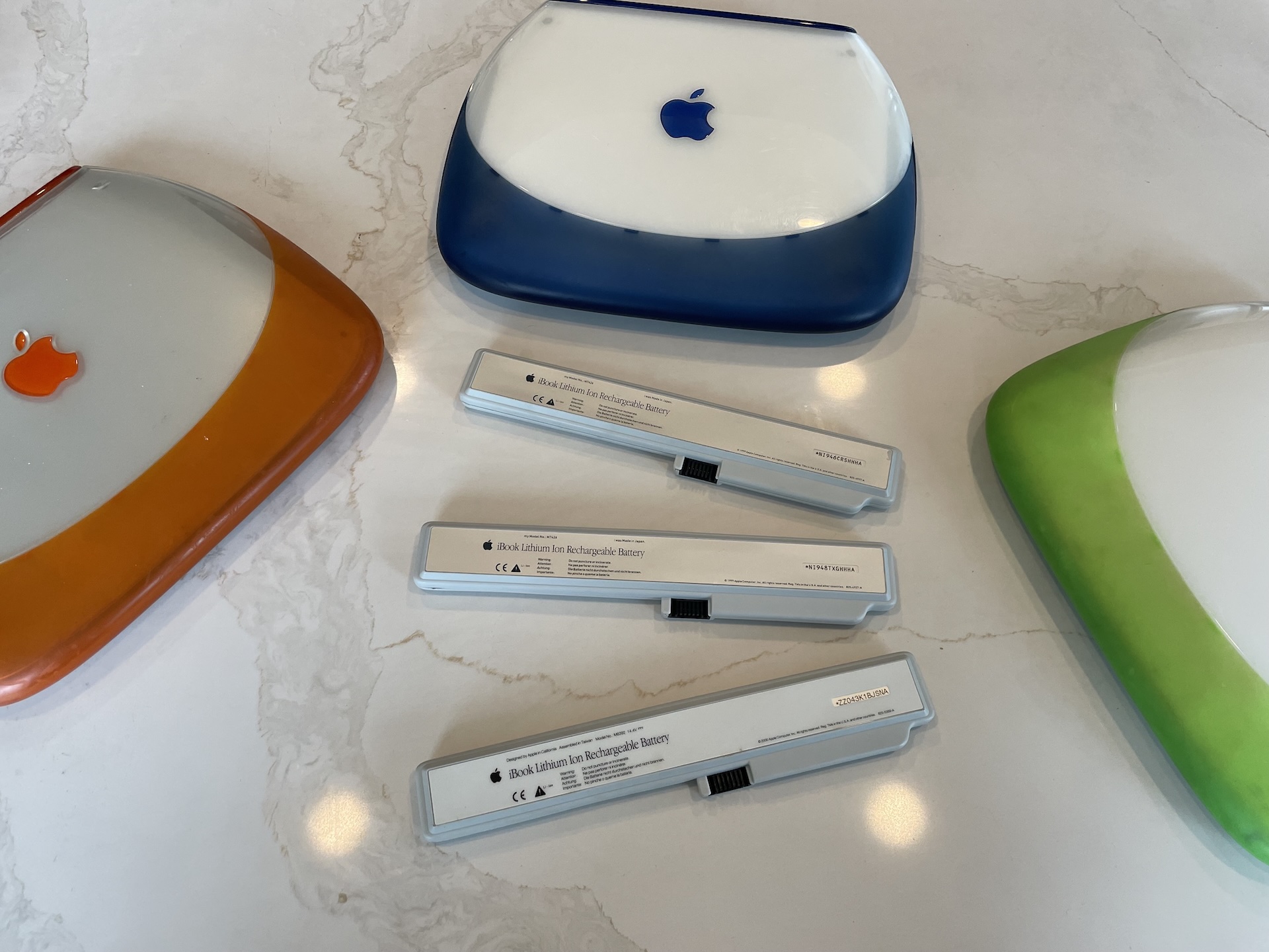 A gaggle of hungry iBooks surrounds a fertile field full of freshly rebuilt batteries